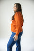 Texas Wicks Woven Striped Detail Sweater